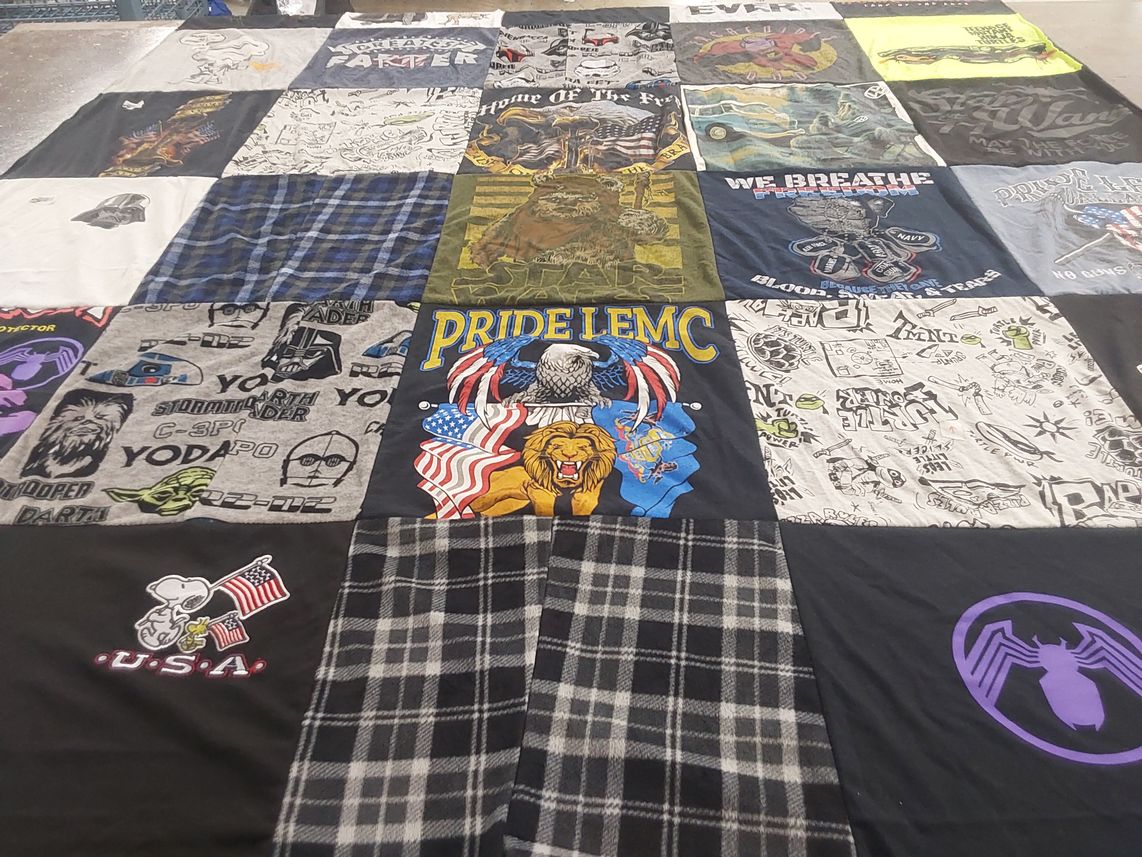 T-shirt quilt with star wars, military themes by Jo from PA