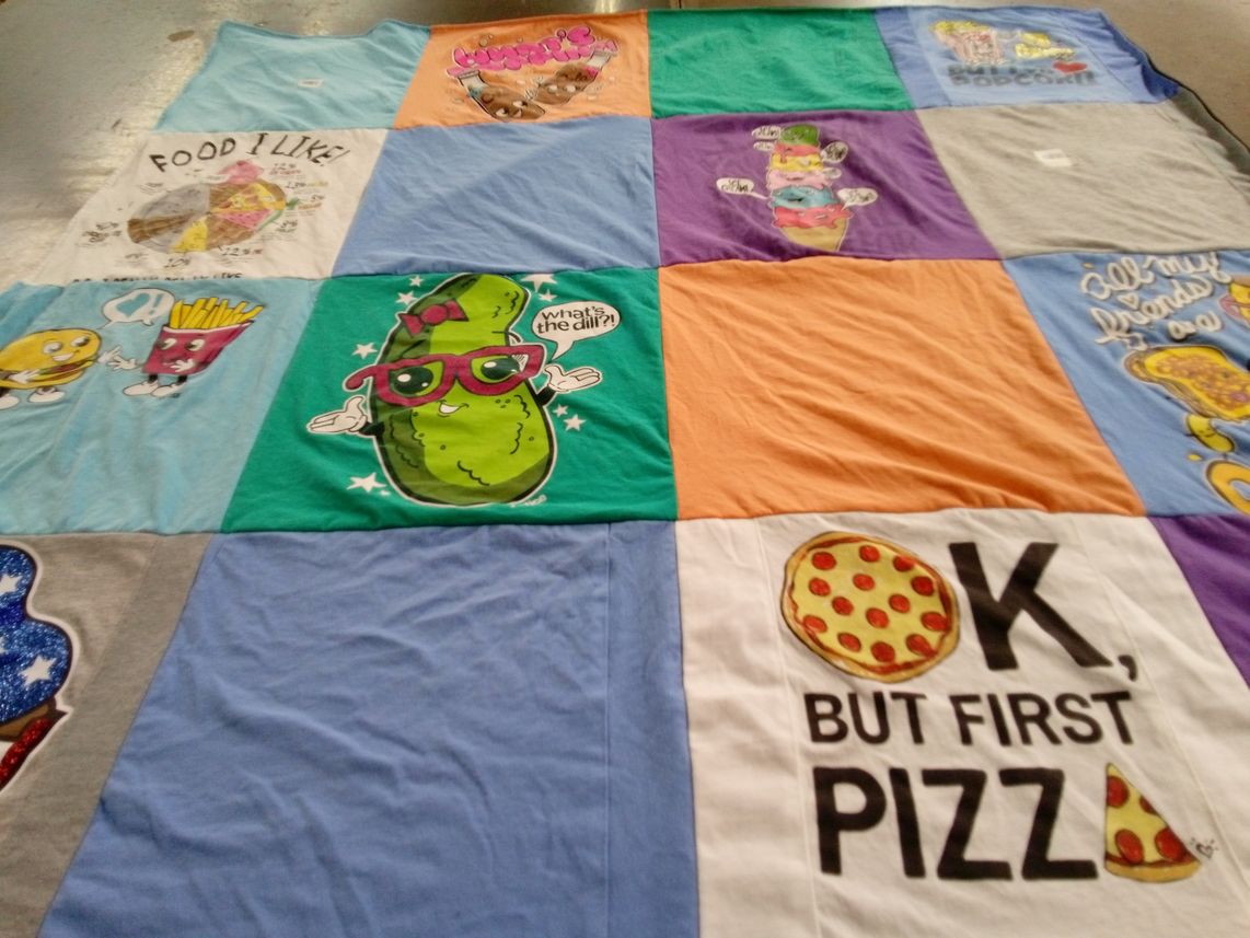 T-shirt quilt with food, snacks themes by Laura from NJ