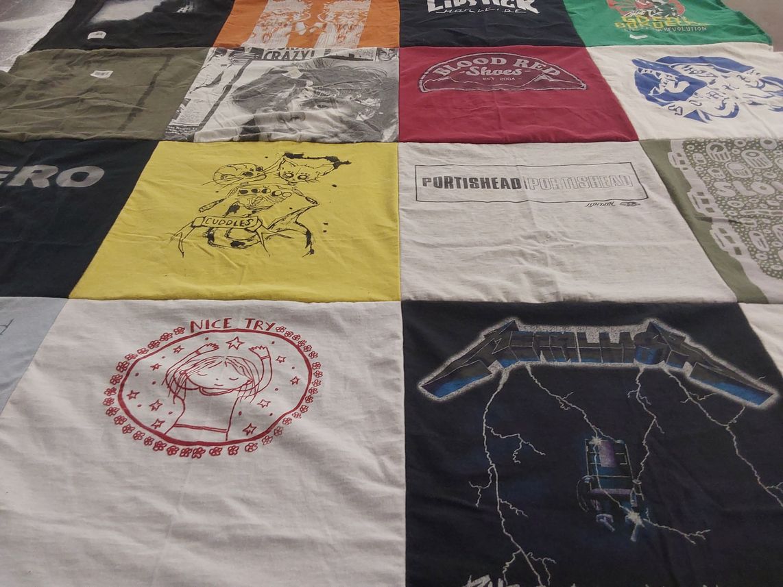 T-shirt quilt with music themes by Adam from MO