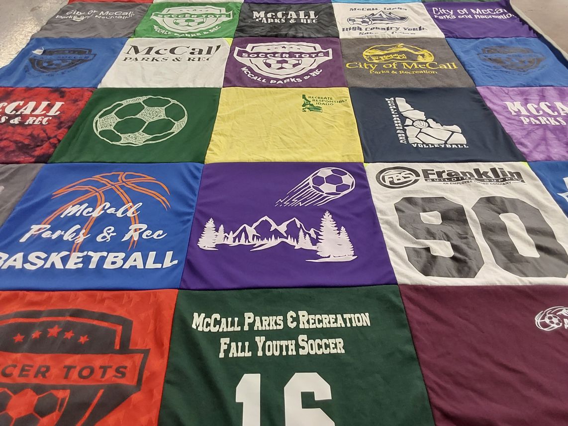 T-shirt quilt with sports, recreation themes by Stefanie from ID
