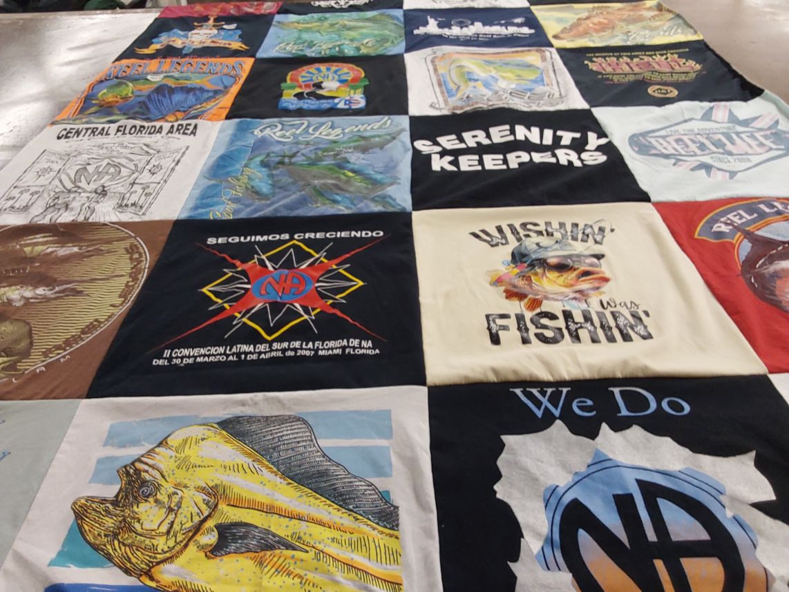 T-shirt quilt with fishing themes by Ruben from NJ