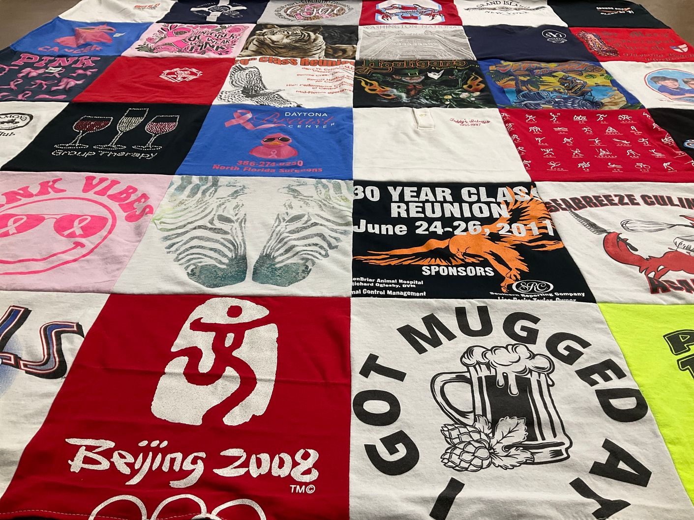 T-shirt quilt with reunions, beijing olympics themes by Debbie from FL
