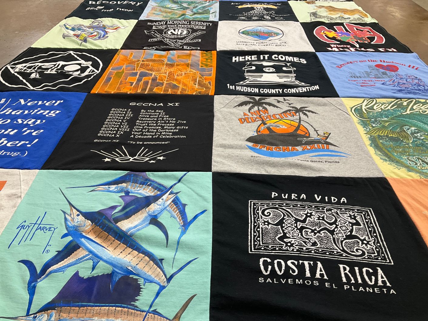 T-shirt quilt with fishing, recovery themes by Ruben from NJ