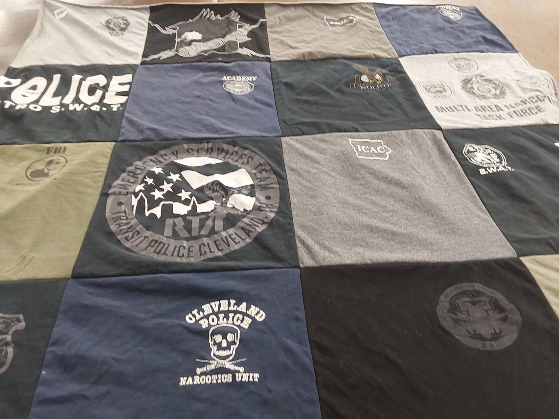T-shirt quilt with law enforcement, public safety themes by Benjamin from IA