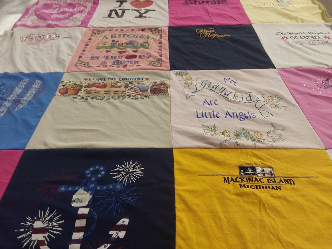 T-shirt quilt with family, travel themes by Ronald from IA
