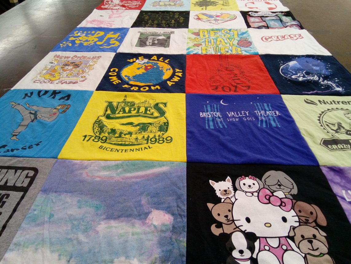 T-shirt quilt with theater, cats themes by David from NY