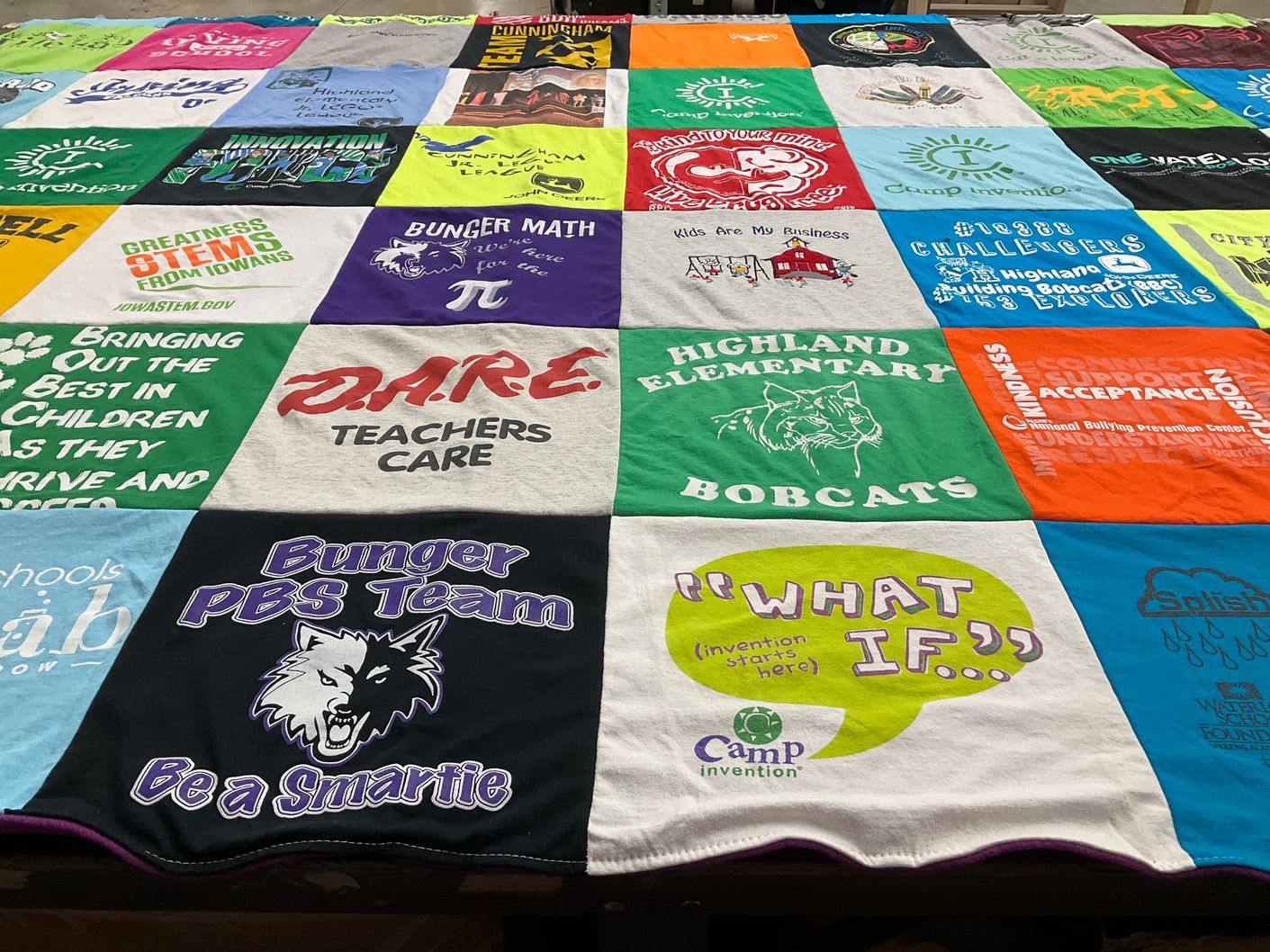 T-shirt quilt featuring bunger pbs team by Carrie from IA