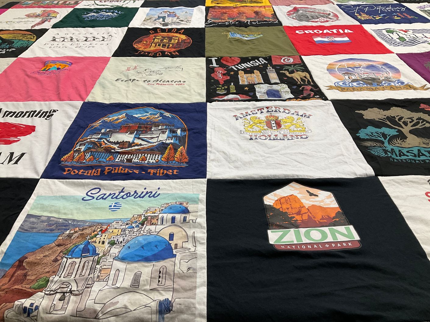 T-shirt quilt with travel, tourism themes by Sandra from MI