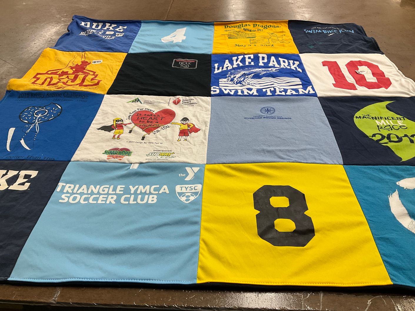 T-shirt quilt featuring lake park swim team, triangle ymca soccer club by Kelli from NC