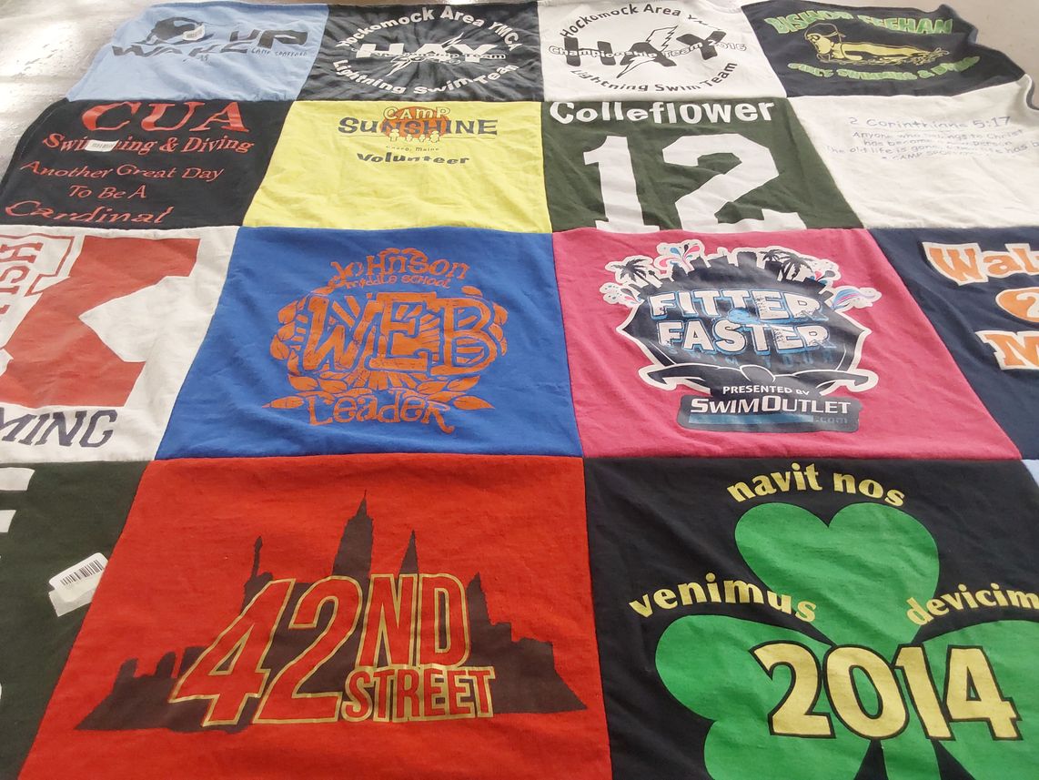 T-shirt quilt featuring lockhaven area lightning swim team by Kathleen from MA