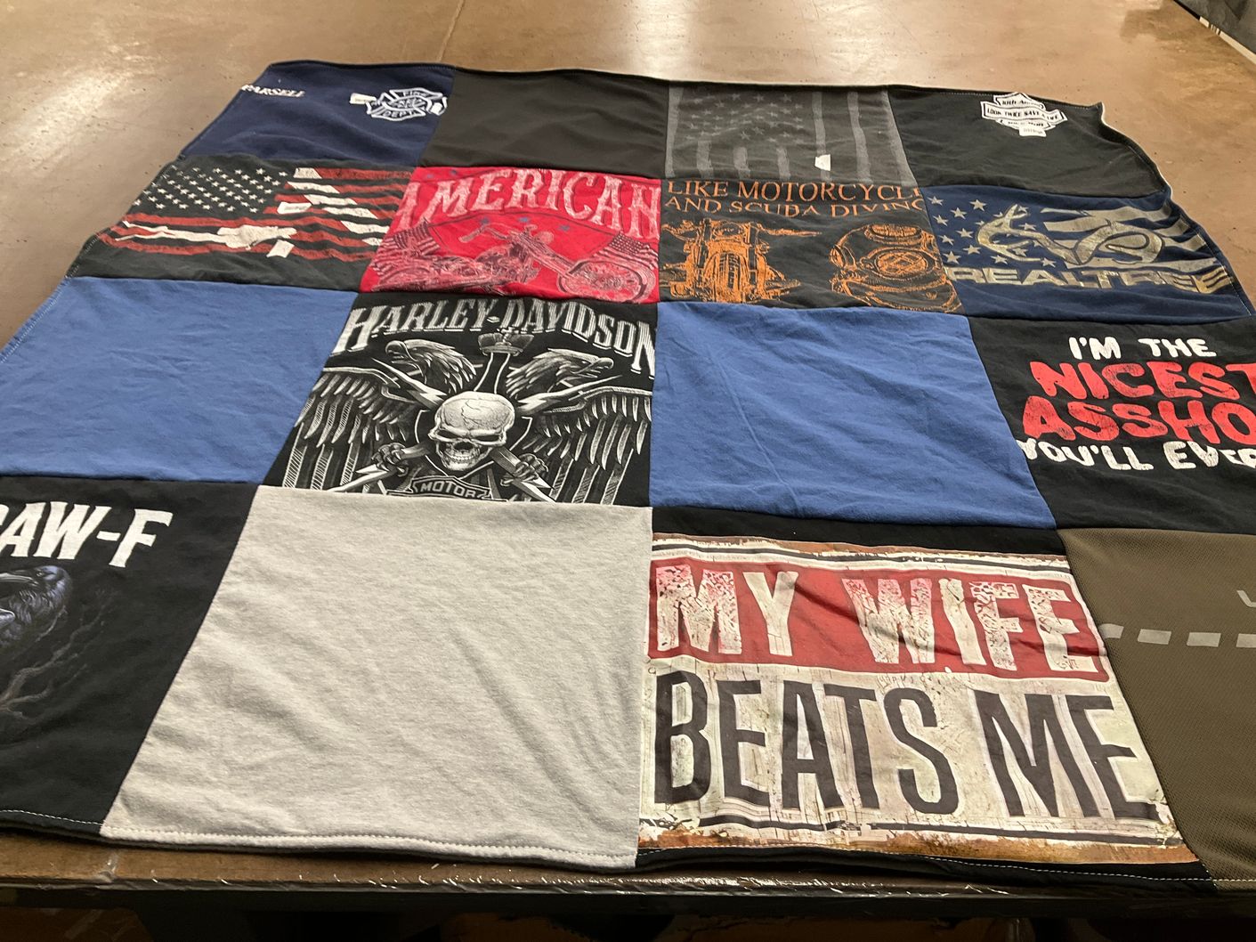 T-shirt quilt with motorcycles, scuba diving themes by Fawn from MI