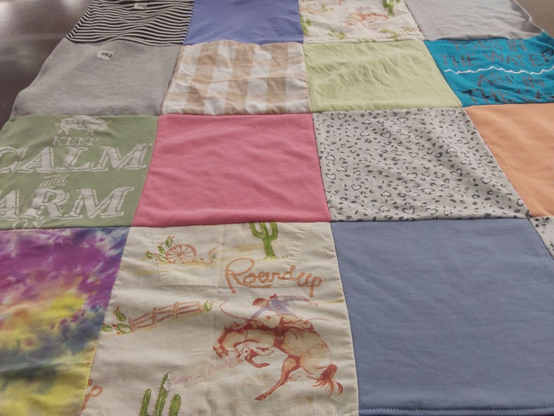 T-shirt quilt with country, western themes by Kara from PA