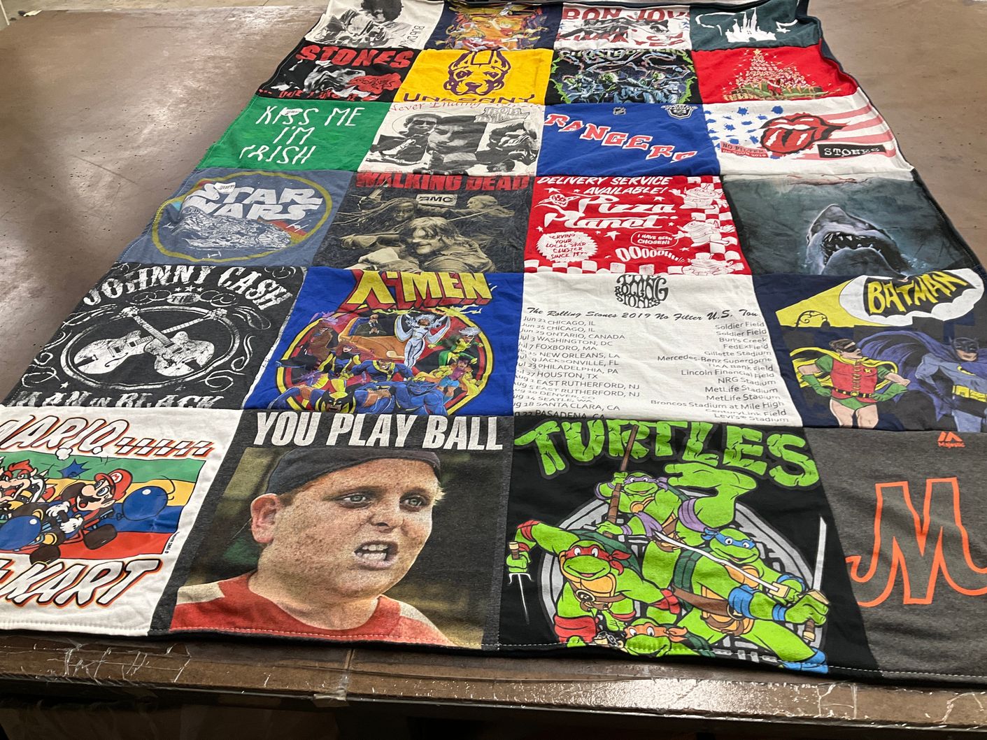 T-shirt quilt with music, movies themes by Mary from NY