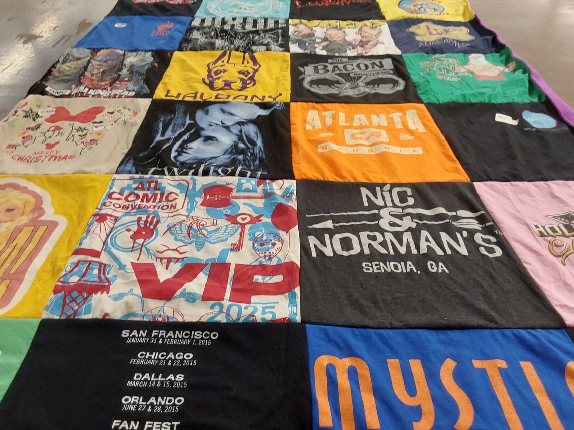 T-shirt quilt with conventions, tv shows themes by Mary from NY
