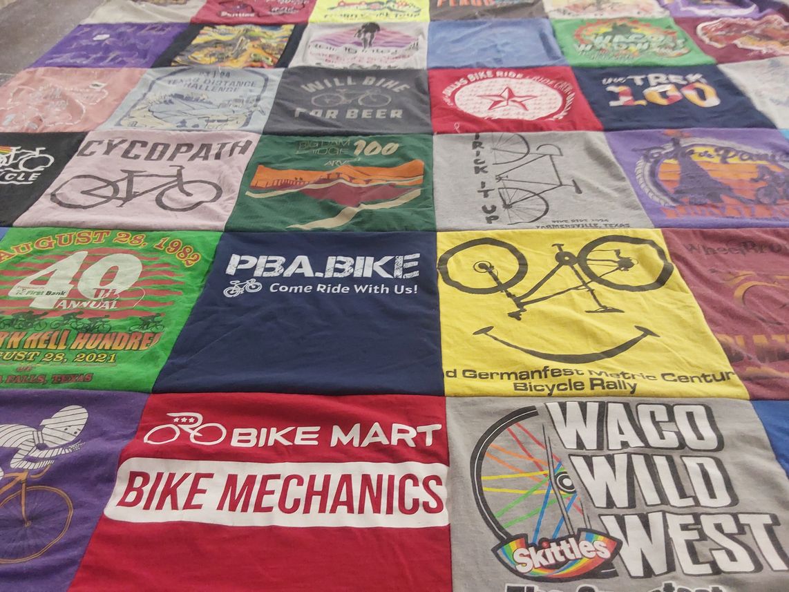 T-shirt quilt with cycling, biking themes by Sarah from TX
