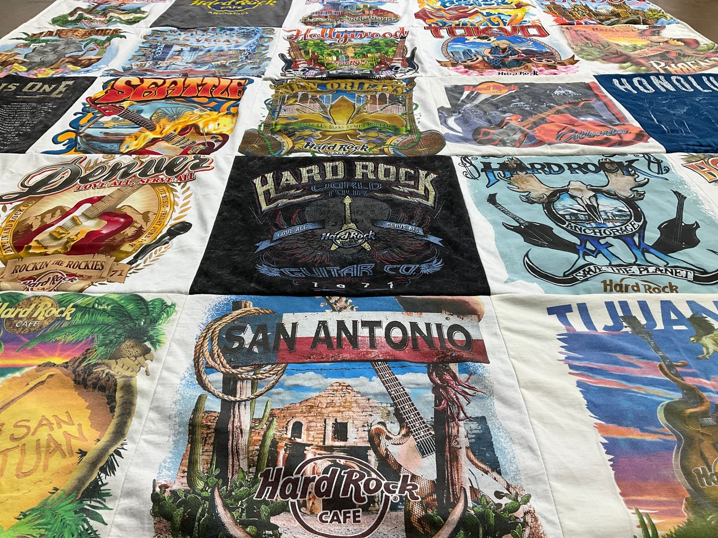 T-shirt quilt with music, travel themes by Kathleen from AZ
