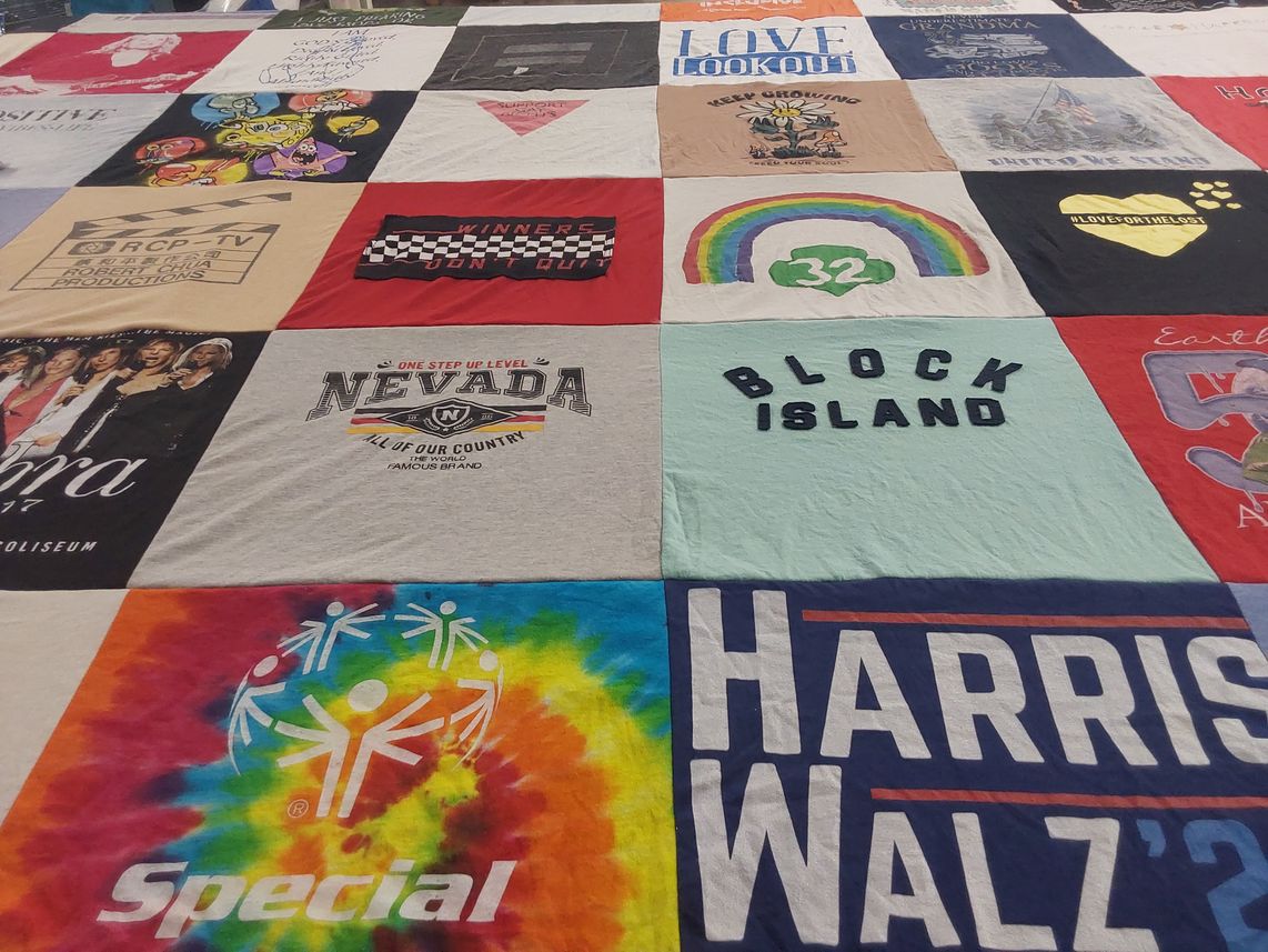 T-shirt quilt with travel, sports themes by Francesca from CT