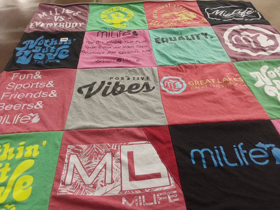 T-shirt quilt with sports, socializing themes by Meghan from MI