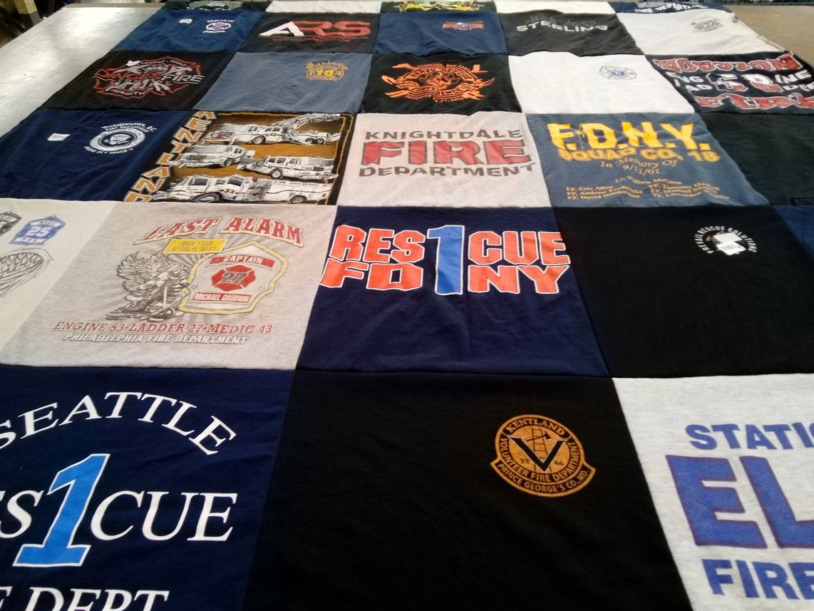 T-shirt quilt with firefighting, rescue operations themes by Claire from NC