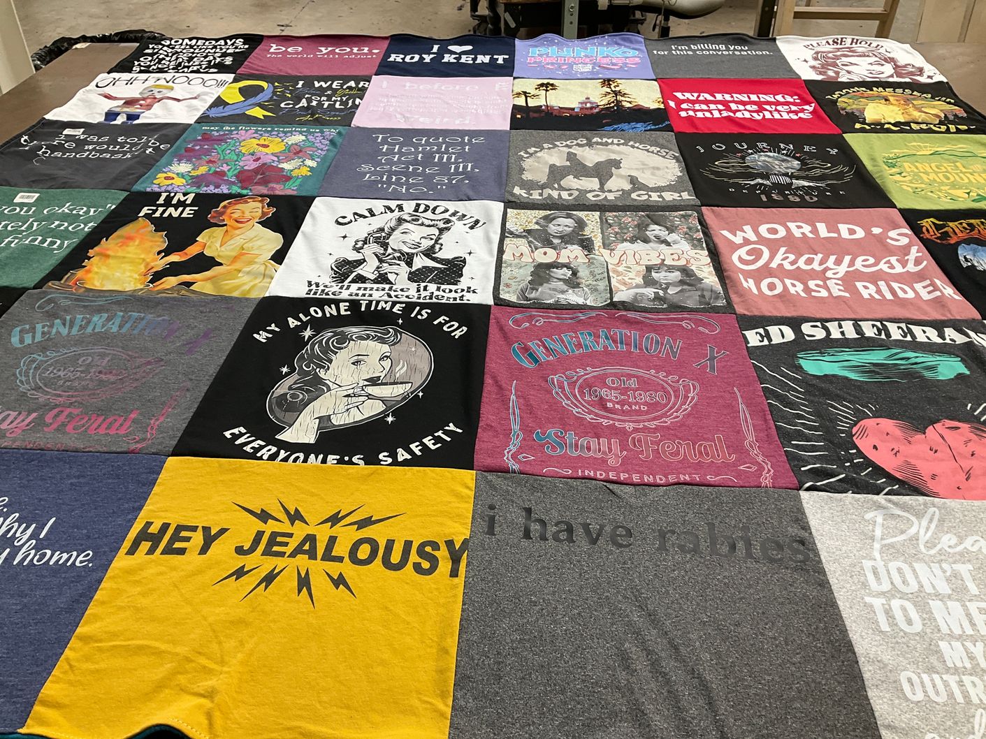 T-shirt quilt with pop culture, music themes by Angela from IN