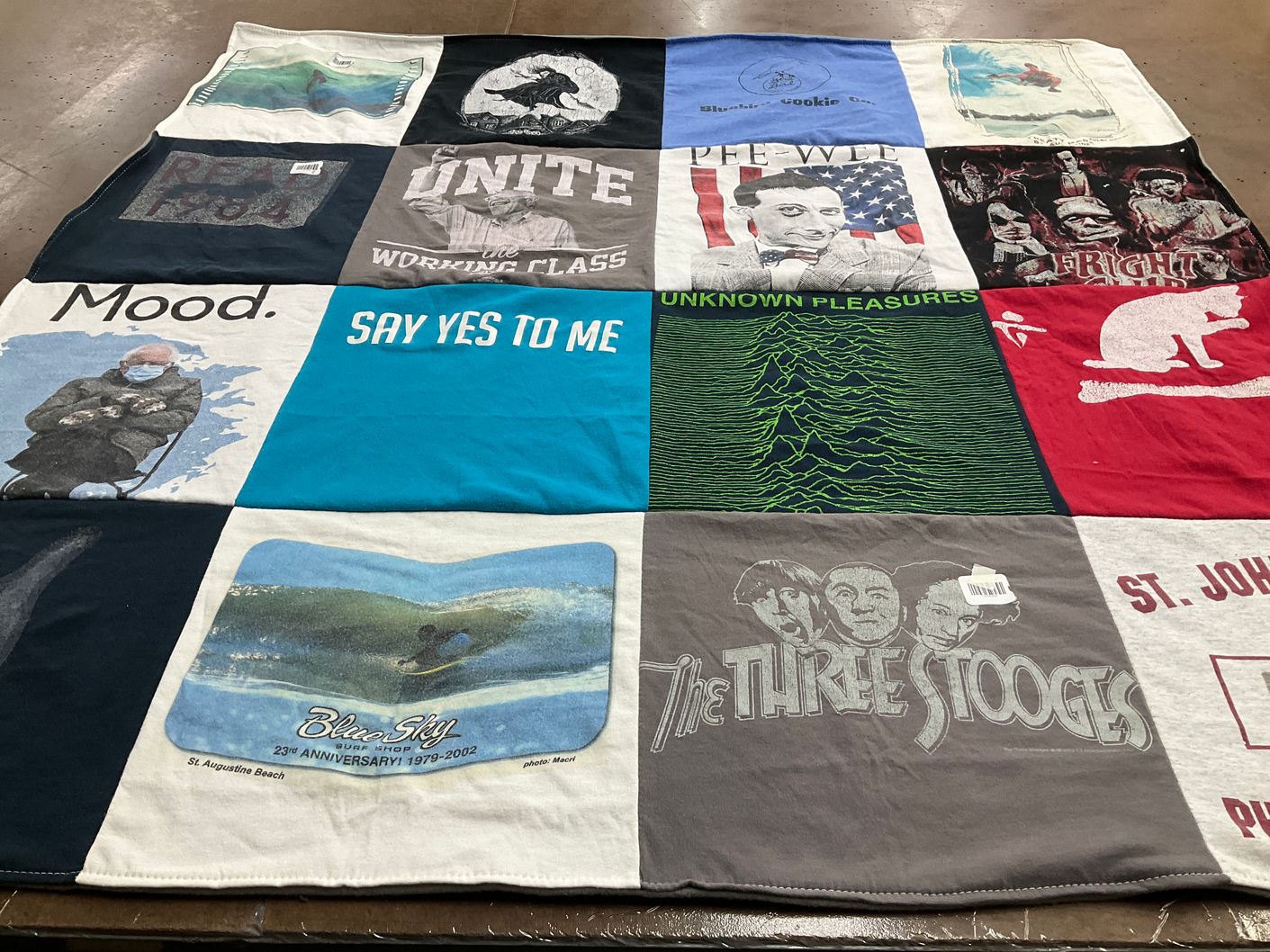 T-shirt quilt with surfing, pop culture themes by Nancy from FL