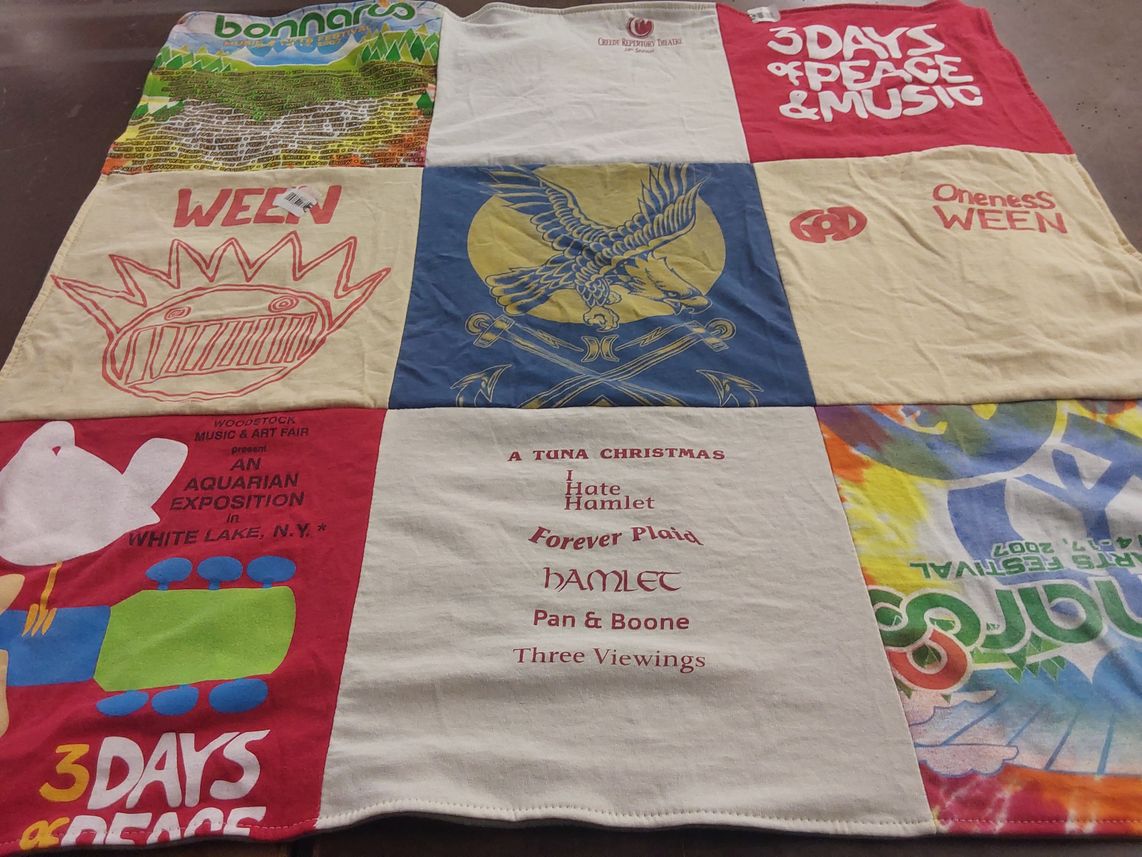 T-shirt quilt with music, theater themes by Erin from CO