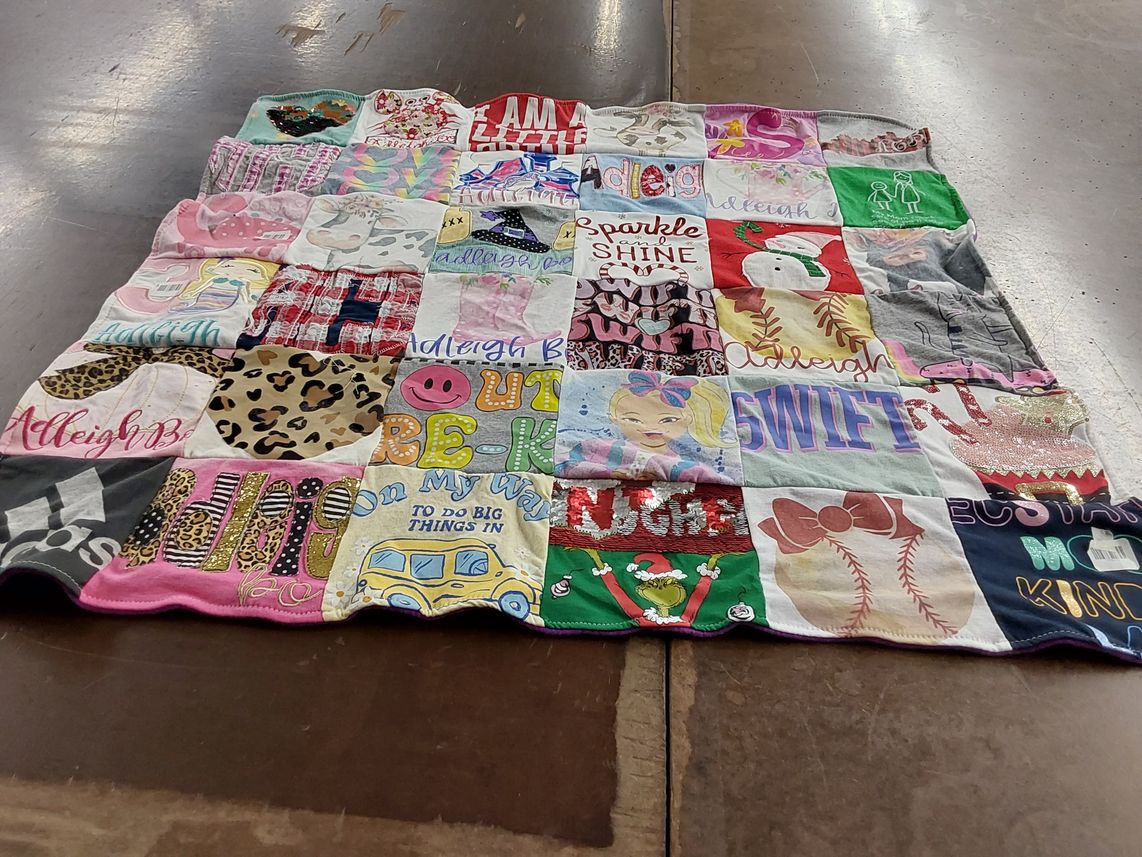T-shirt quilt with fashion, pop culture themes by JoEllen from KY