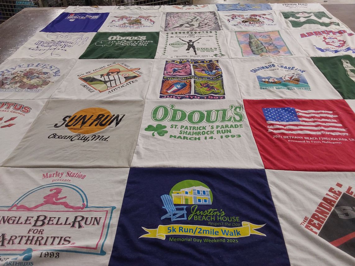 T-shirt quilt with running, community events themes by Rodney from DE