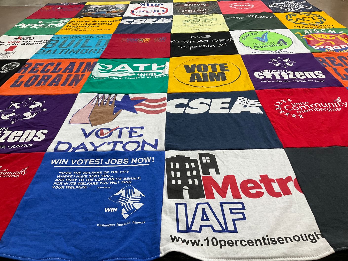 T-shirt quilt with community activism, voter engagement themes by Loree from MD