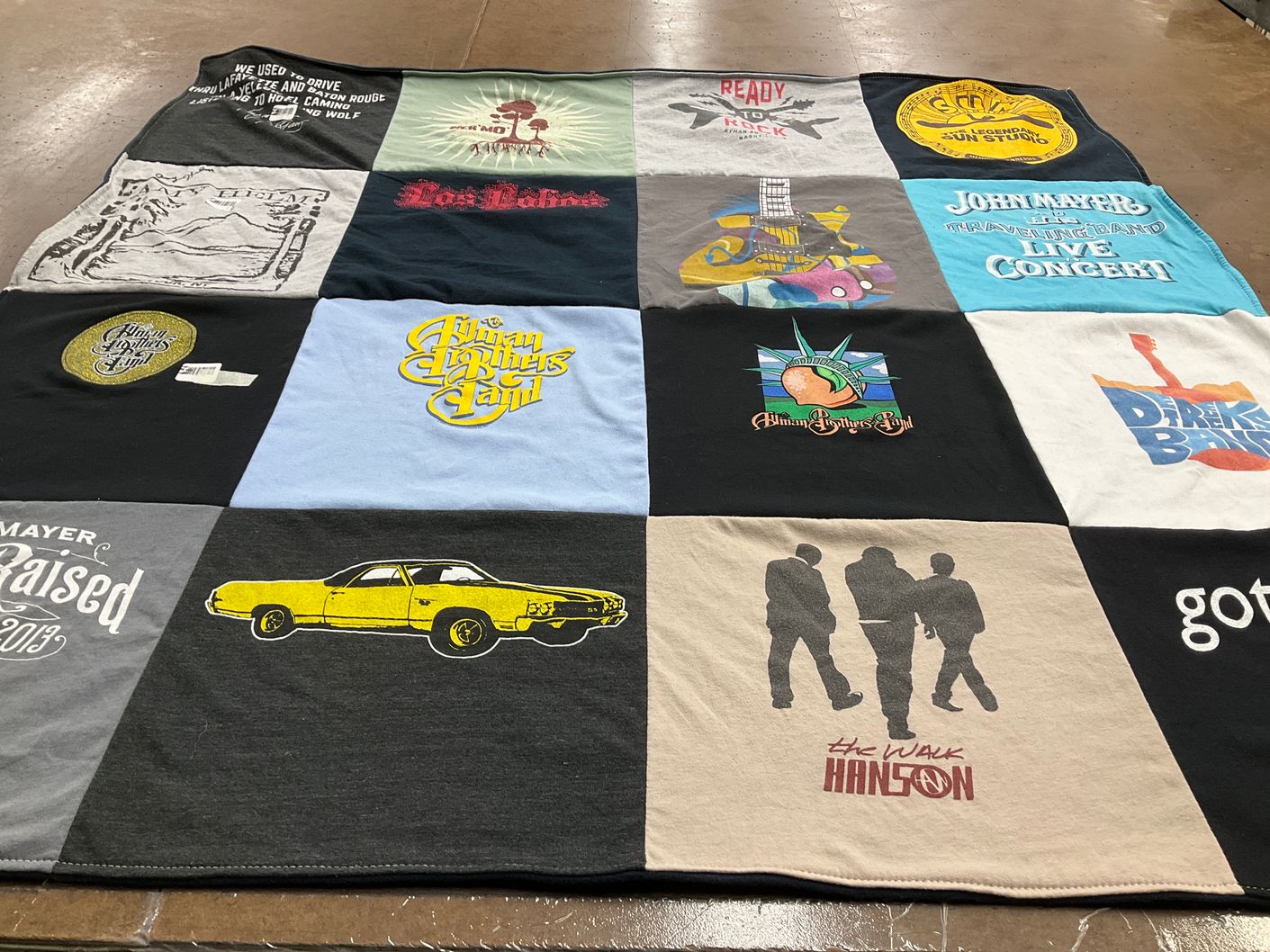 T-shirt quilt with music, concerts themes by Joanne from NY