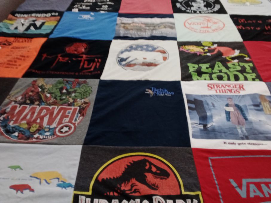 T-shirt quilt with gaming, comics themes by Monica from TN