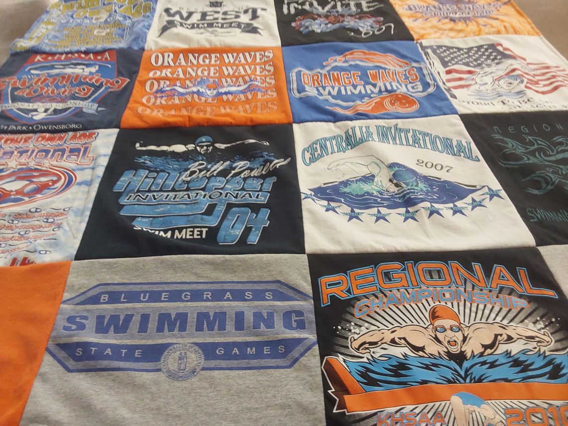 T-shirt quilt with swimming, sports themes by Ann from KY