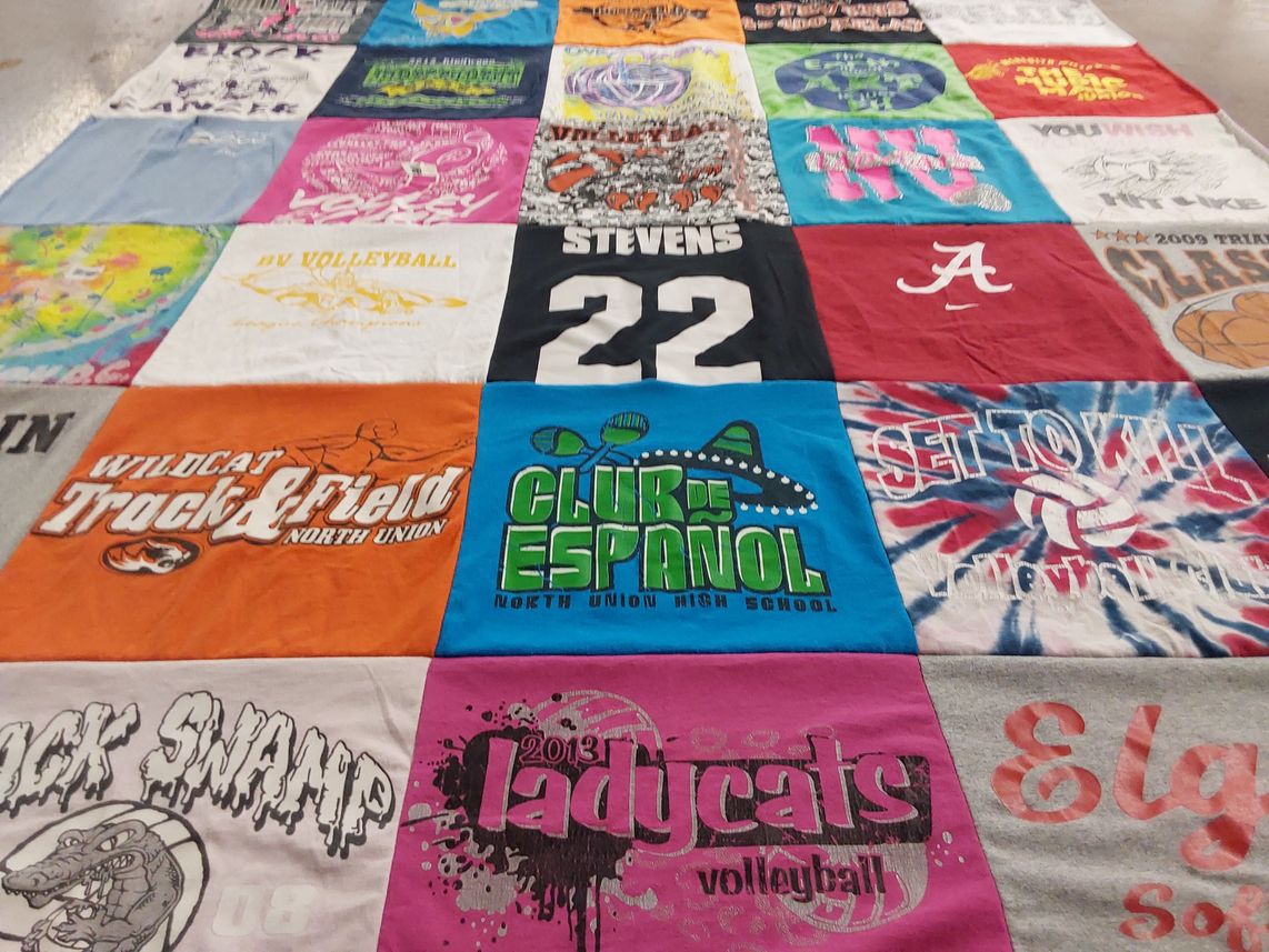 T-shirt quilt featuring wildcat volleyball, wildcat track and field by Sandy from OH