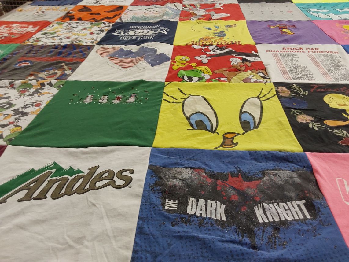 T-shirt quilt with cartoons, racing themes by Dennis from WI
