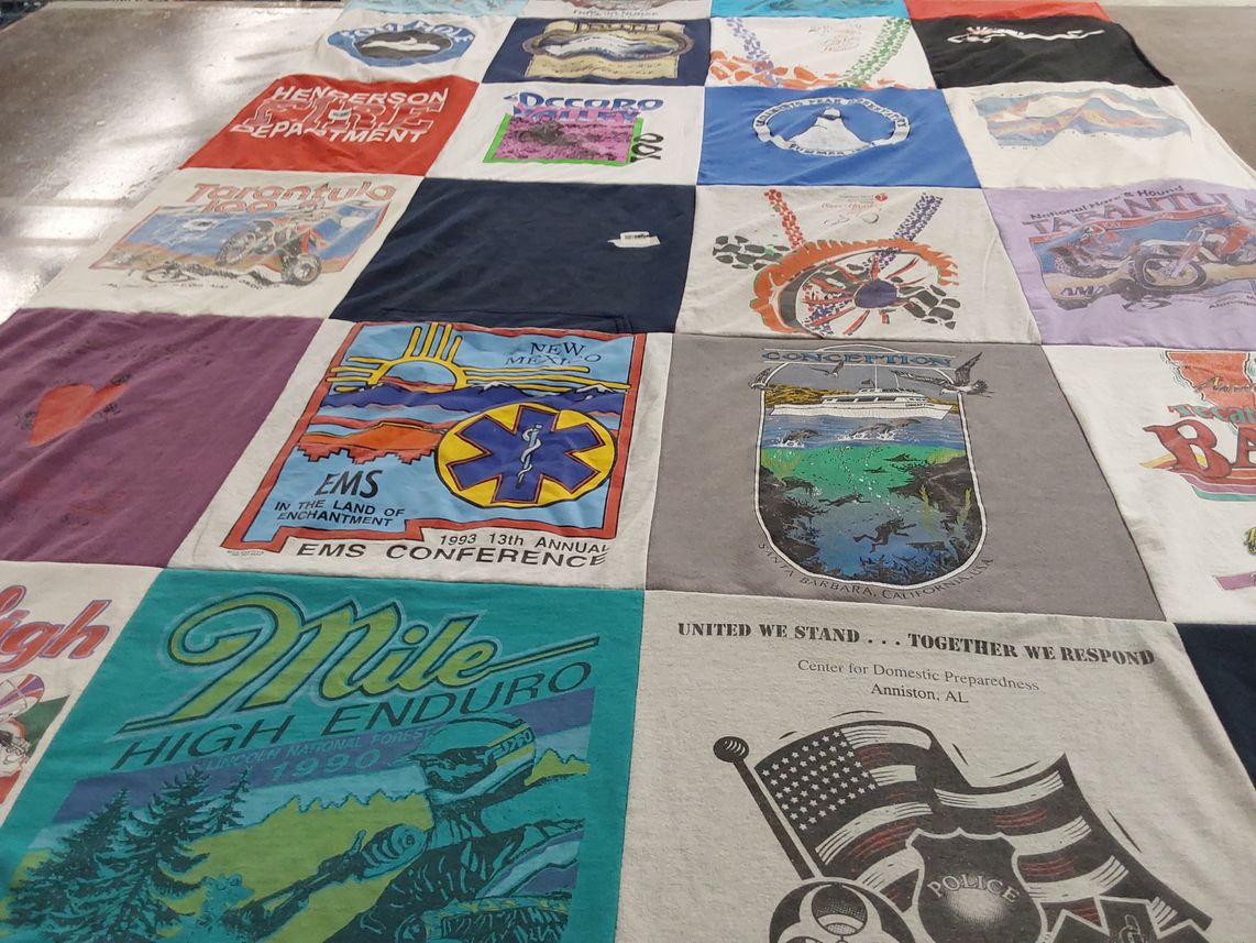 T-shirt quilt with emergency services, motorcycling themes by Randall from NM