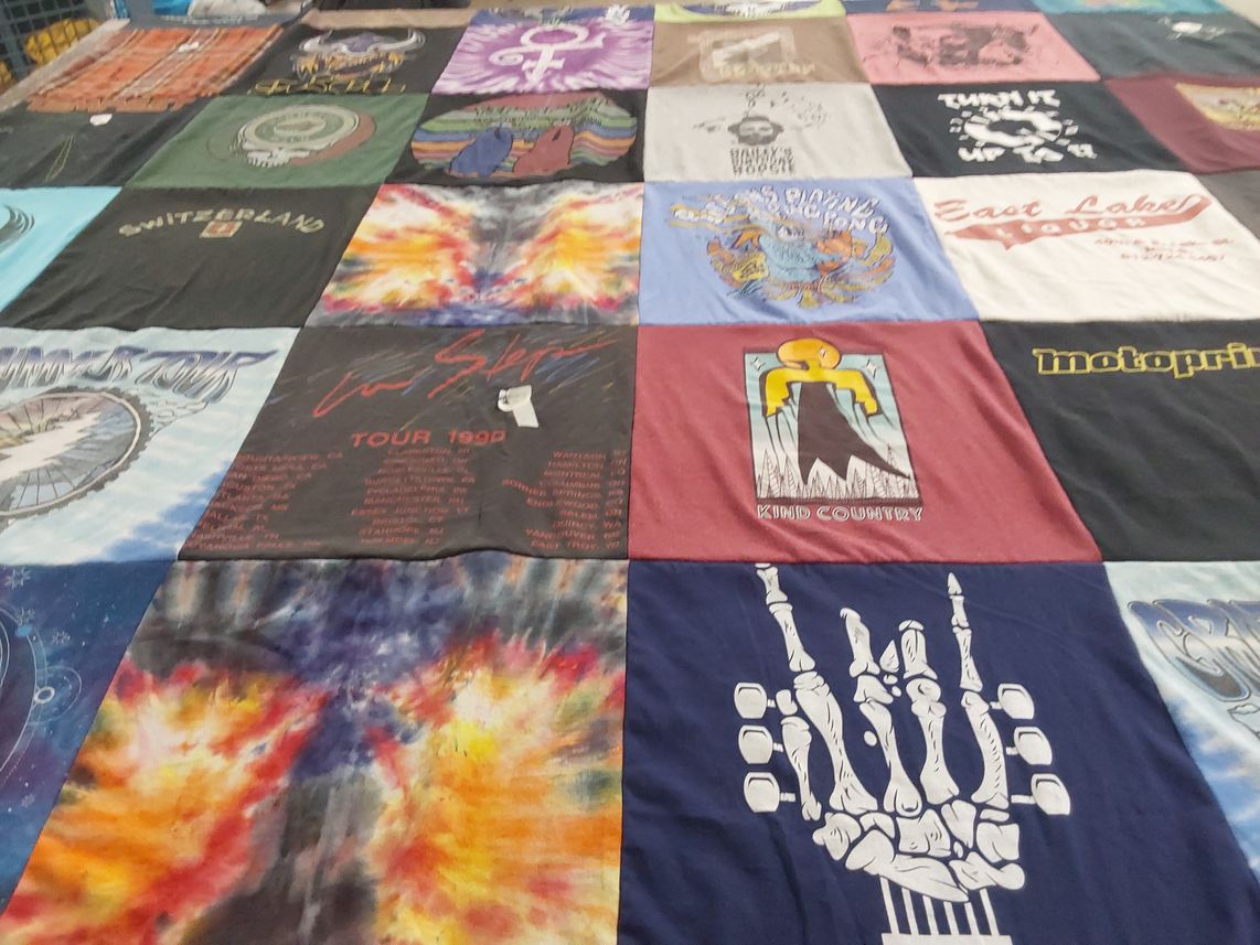 T-shirt quilt with music, bands themes by Debbi from MN
