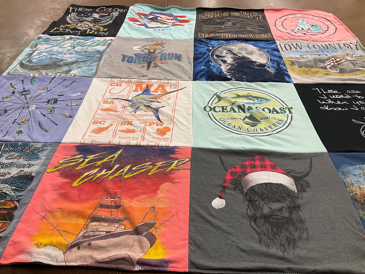 T-shirt quilt with fishing, ocean activities themes by Cathy from NC