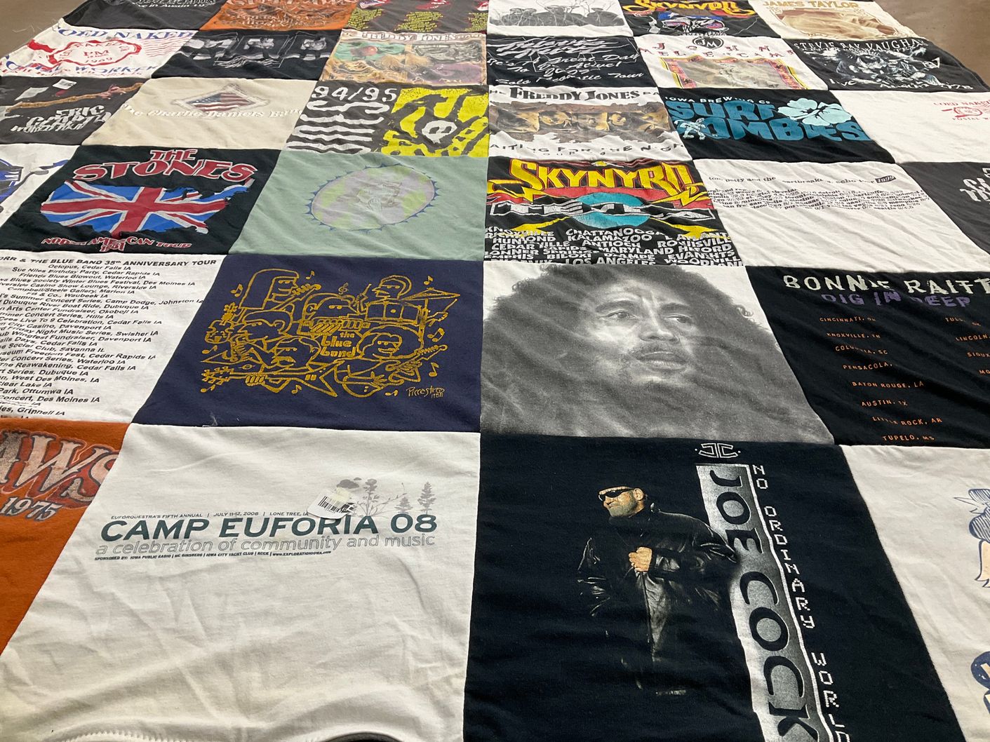 T-shirt quilt with music, concerts themes by Lori from IA