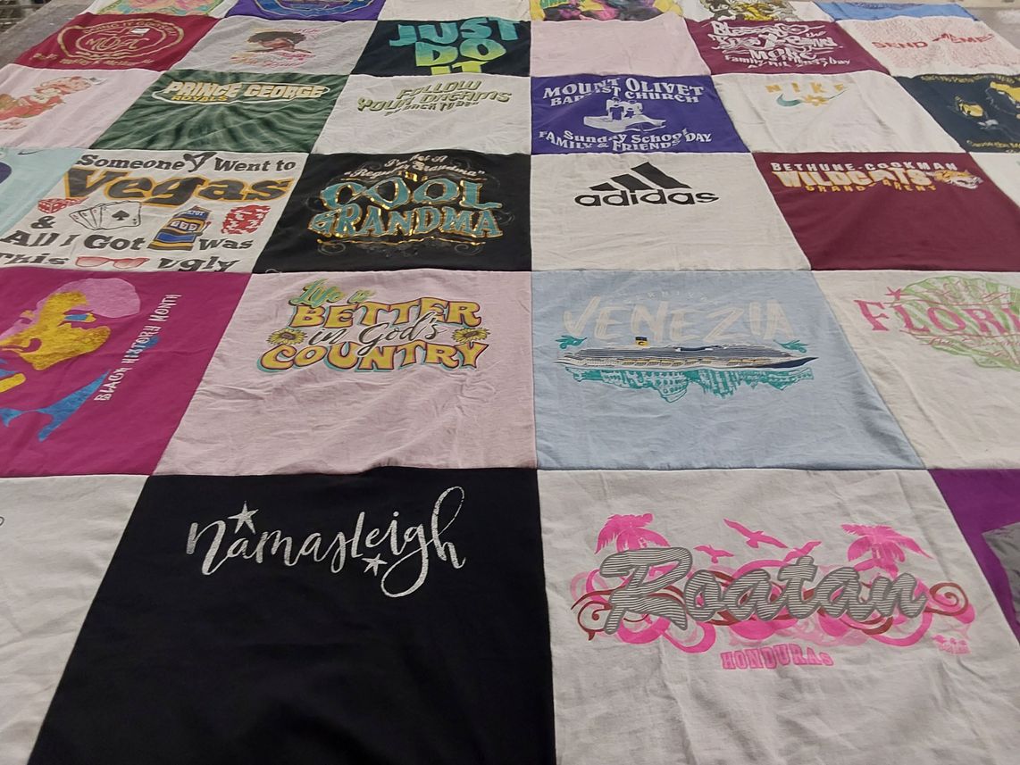 T-shirt quilt with travel, family themes by Wyonetta from VA