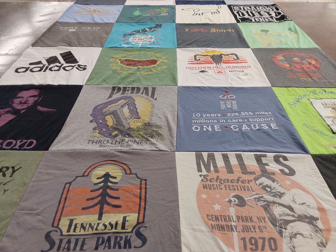 T-shirt quilt with bicycling, music festivals themes by David from TX