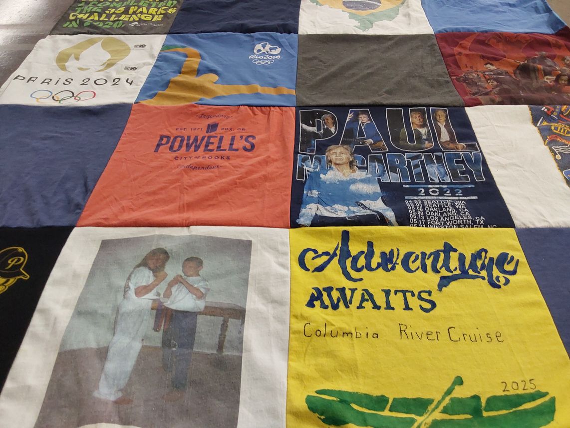 T-shirt quilt with sports, music themes by Penni from CA