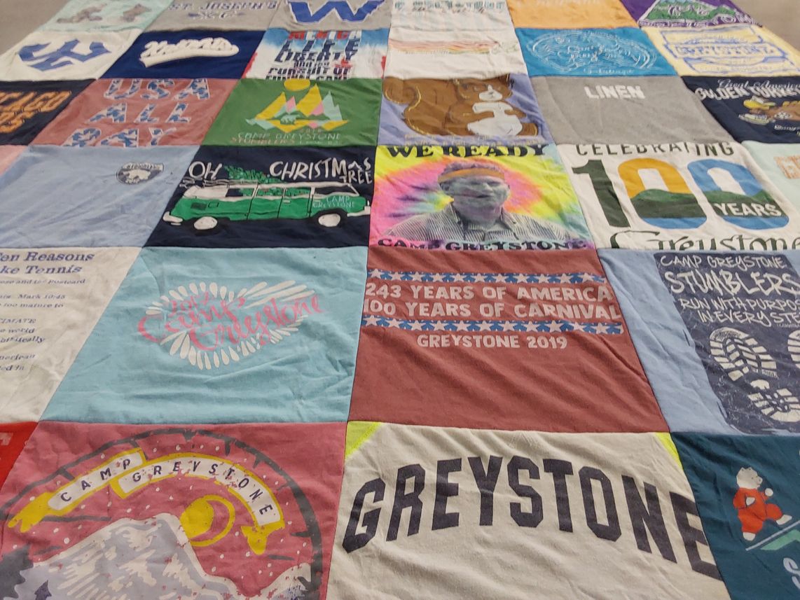 T-shirt quilt with camping, celebrations themes by Laura from SC
