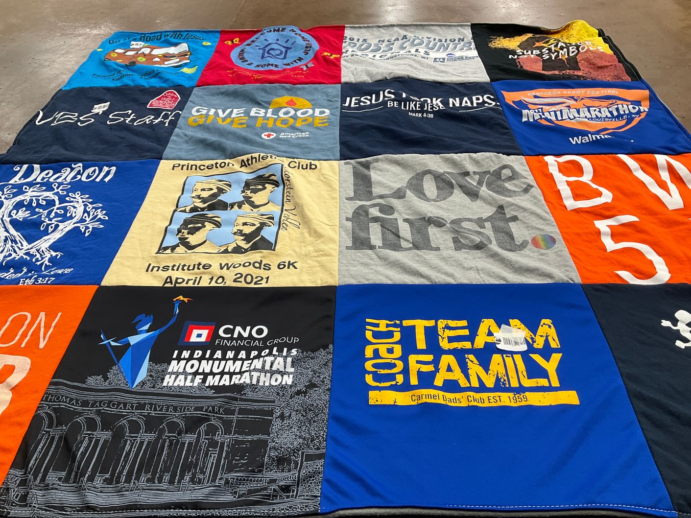 T-shirt quilt with running, volunteering themes by Robin from IN