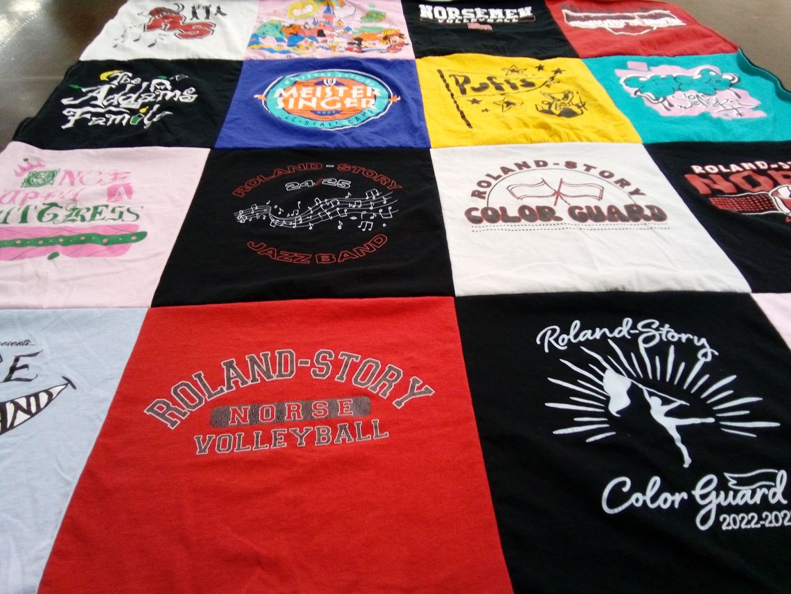 T-shirt quilt featuring roland-story volleyball, roland-story color guard by Emily from IA