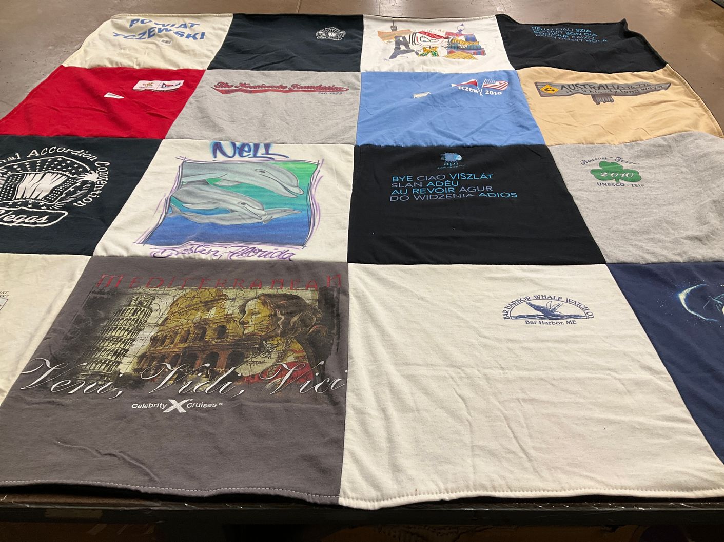 T-shirt quilt with travel, whale watching themes by Nell from TN