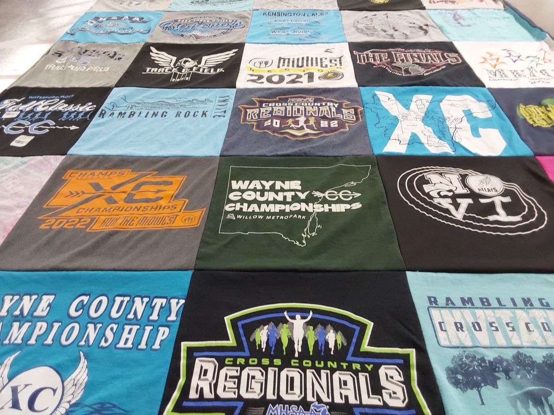 T-shirt quilt with cross country, track and field themes by ERIK from MI