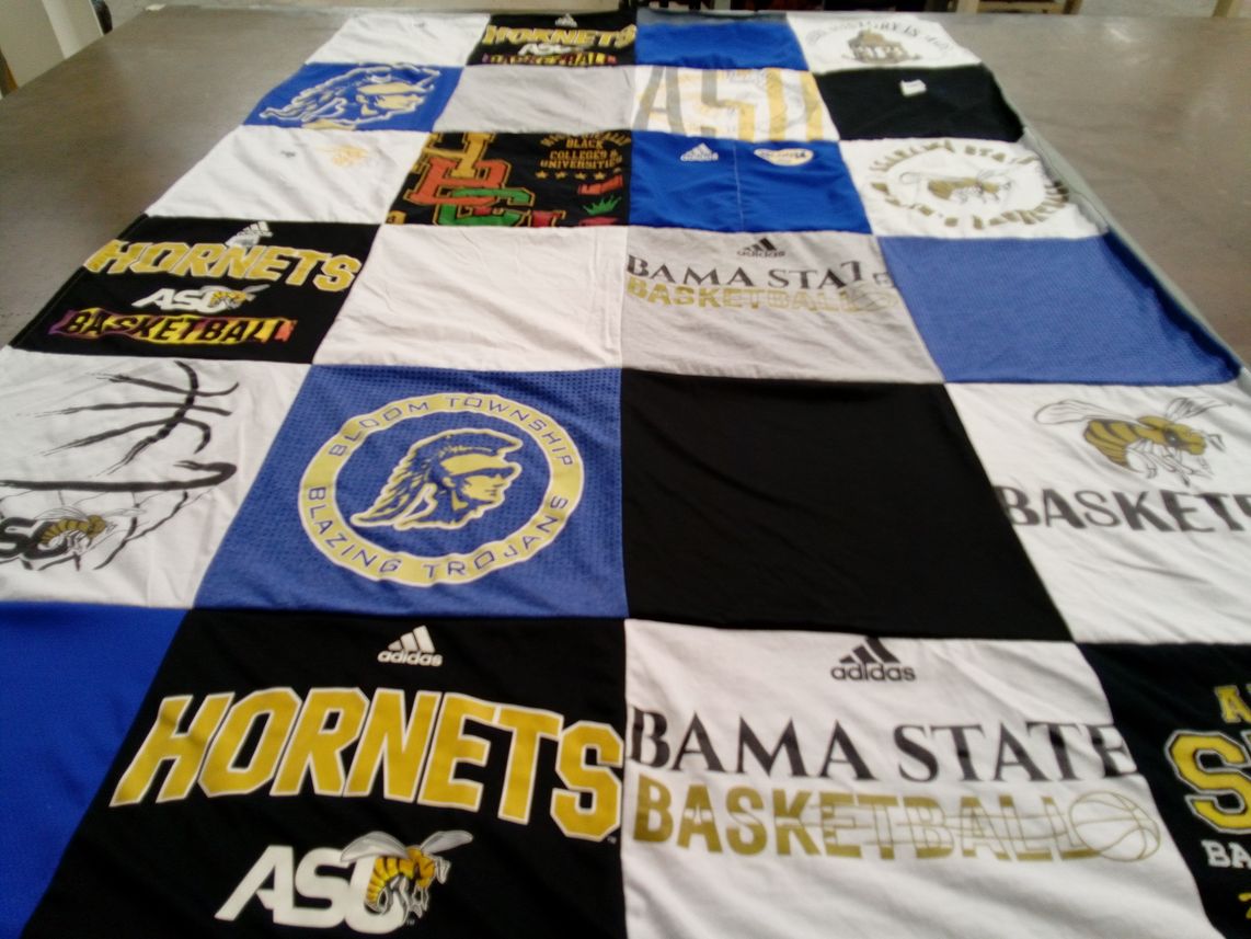 T-shirt quilt featuring alabama state university hornets, bloom township blazing trojans by Heather from TX