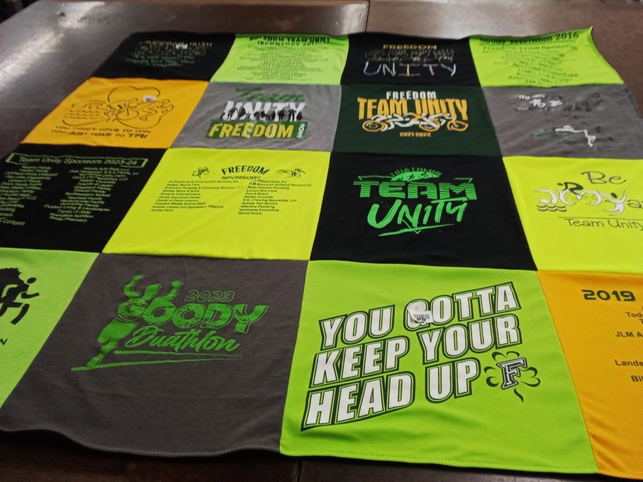 T-shirt quilt with athletics, sports themes by Dana from WI