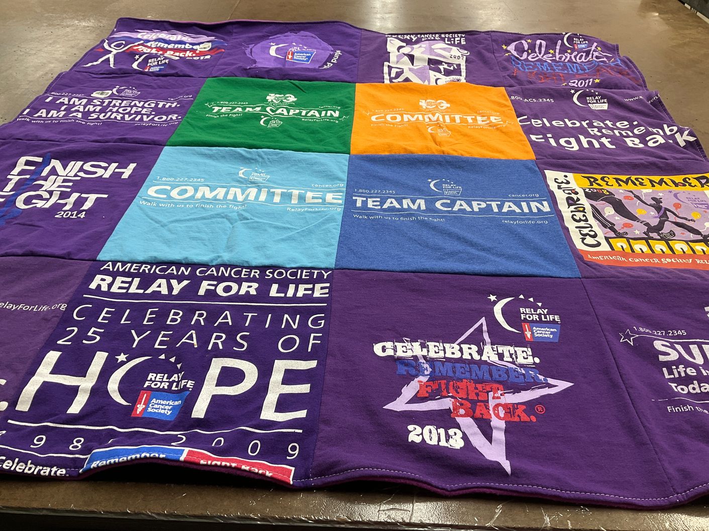 T-shirt quilt with cancer awareness, survivorship themes by Evelyn from VA