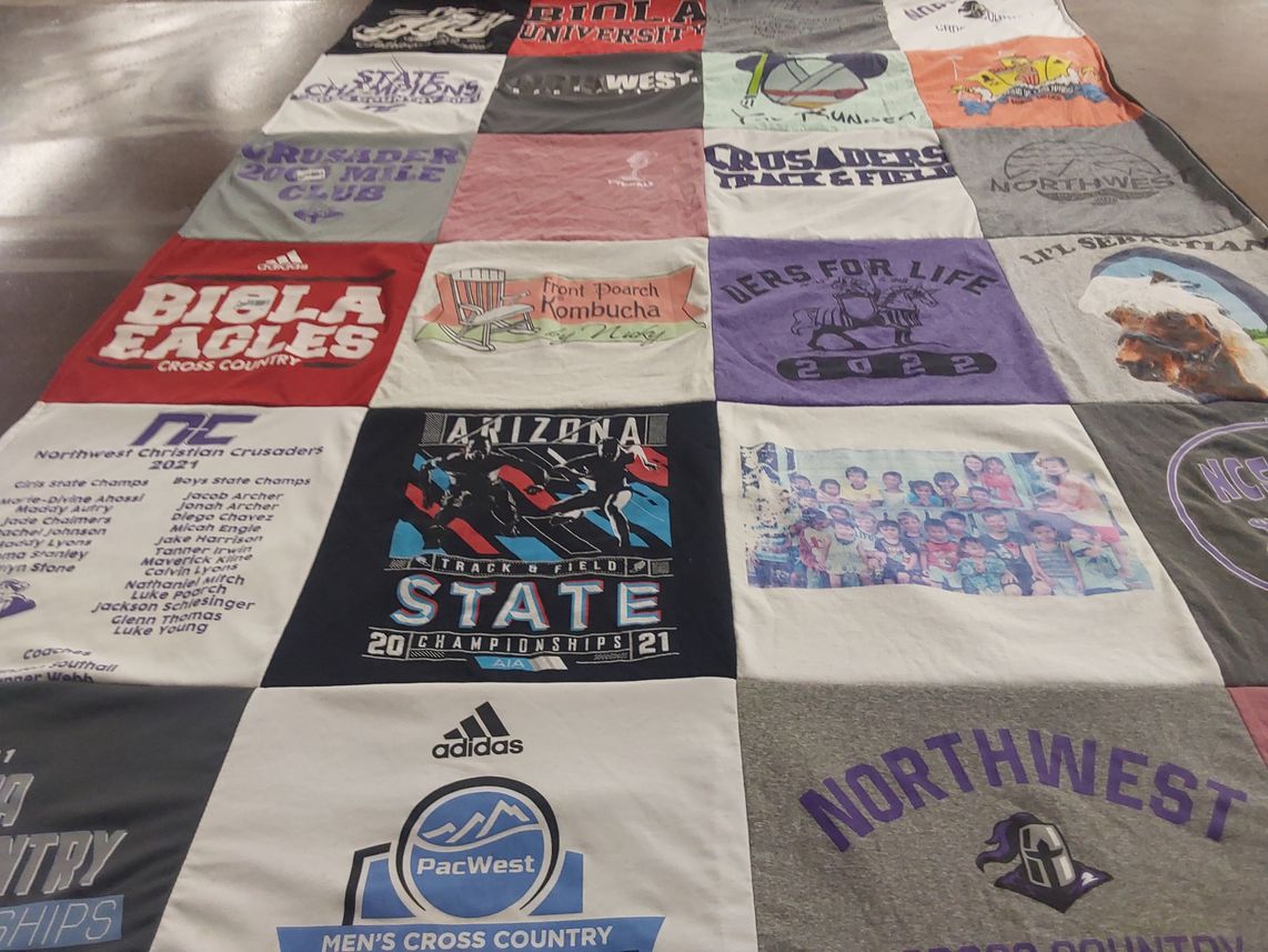 T-shirt quilt featuring biola eagles cross country, northwest christian crusaders men's cross country by Nicolette from AZ